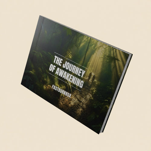 FastBurnBox "The Journey of Awakening" hardcover guide book with a jungle trail cover on cream